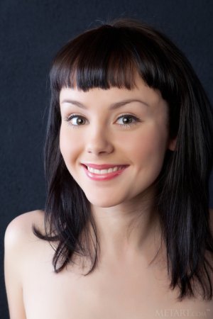 Mirelle A – Hottie squeezes boobs on chair photo 7