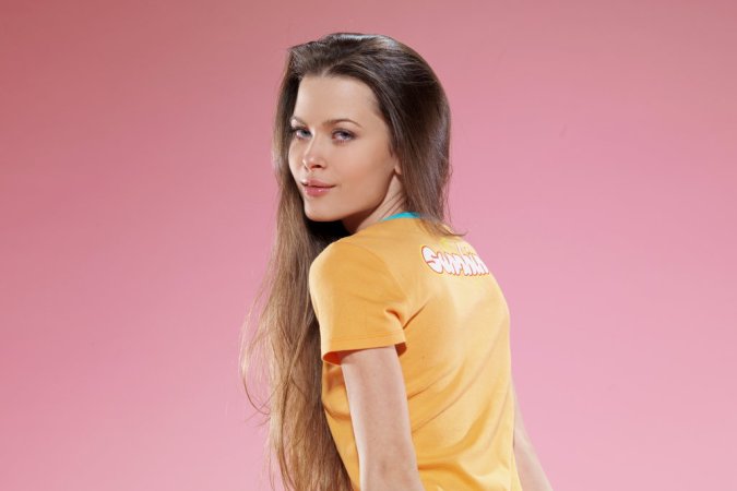 Amelie B – Chick undresses in photo studio photo 3