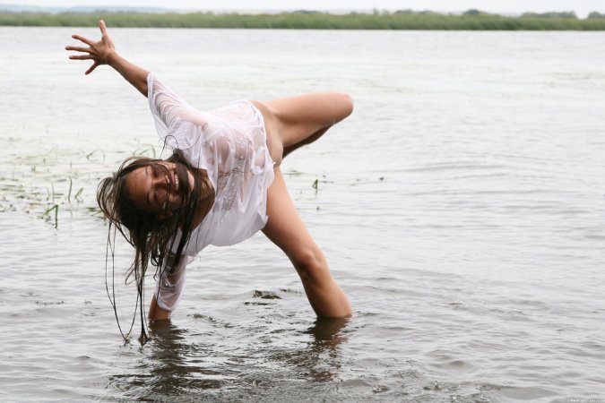 Freya A – Babe in white shirt swims in river photo 11