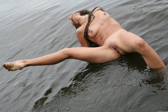 Freya A – Babe in white shirt swims in river photo 13