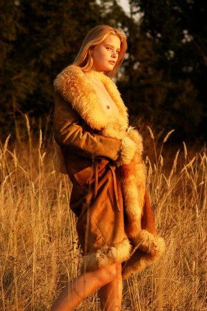 Andrea C – Cutie in fur coat takes a walk photo 4