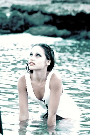 Liliana – Half-naked babe swims in river photo 4