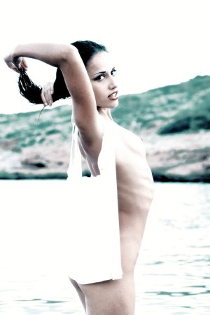 Liliana – Half-naked babe swims in river photo 11