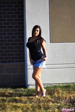 Briana Lee – Brunette plays with melons outdoors photo 3